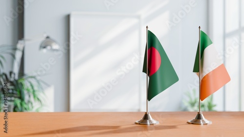 FLAGS OF BANGLADESH AND IRELAND ON TABLE photo