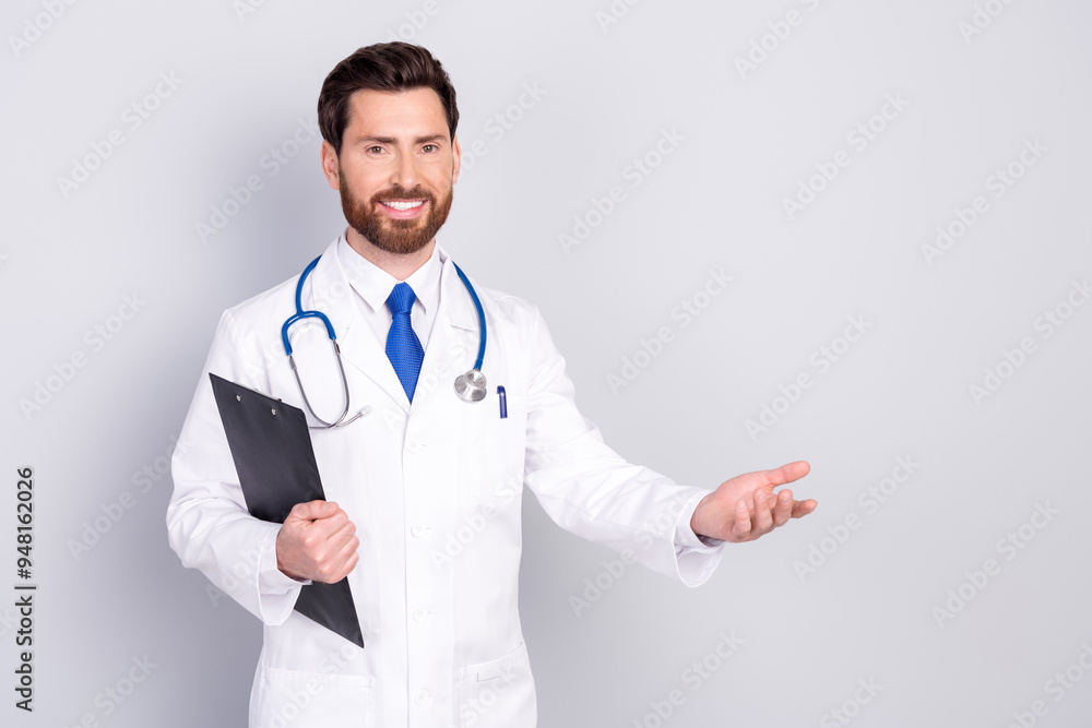 Portrait of experienced doctor man clipboard welcome you wear white coat isolated on grey color background Portrait of experienced doctor man clipboard welcome you wear white coat isolated on grey color background