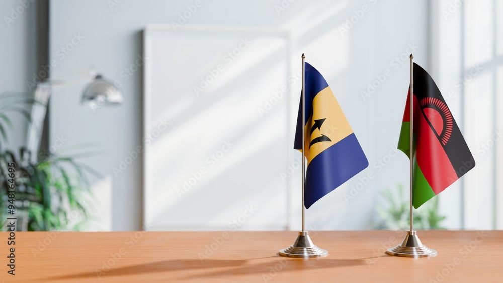 FLAGS OF BARBADOS AND MALAWI ON TABLE FLAGS OF BARBADOS AND MALAWI ON TABLE