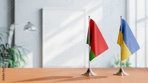 FLAGS OF BELARUS AND UKRAINE ON TABLE photo