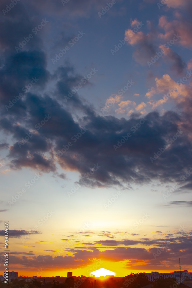 the evening sky after sunset showcases a mesmerizing blend of deep blues and fiery oranges, with delicate clouds adding texture and depth to the tranquil scene the evening sky after sunset showcases a mesmerizing blend of deep blues and fiery oranges, with delicate clouds adding texture and depth to the tranquil scene