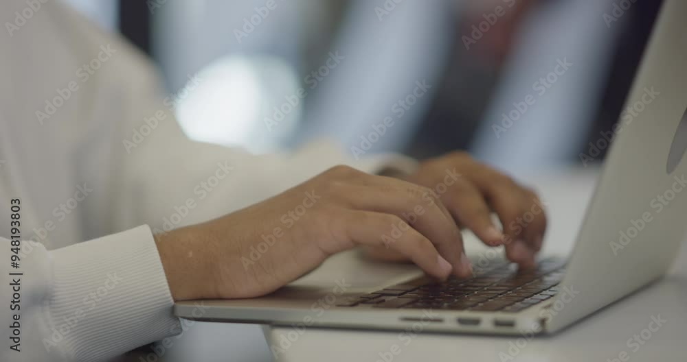 In a modern office setting, an African American businessman is diligently working on his laptop, embodying determination, ambition, and productivity in his professional environmen In a modern office setting, an African American businessman is diligently working on his laptop, embodying determination, ambition, and productivity in his professional environmen