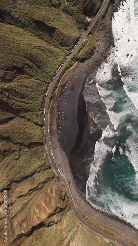 Aerial view of beautiful Playa de Benijo with cliffs and ocean waves, Benijo, Spain. photo