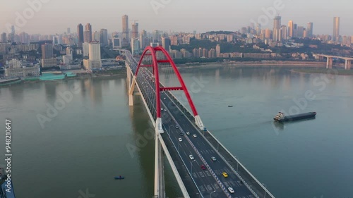 aerial footage of the majestic Caiyuanba Yangtze River Bridge in Chongqing photo