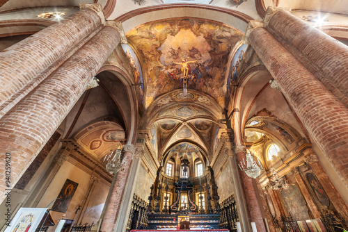 Asti, Italy - Apsis of San Secondo collegiate church ( 7th century; 10th; 15th ), Gothic style interior arch architecture with fresco, is the oldest church in Asti