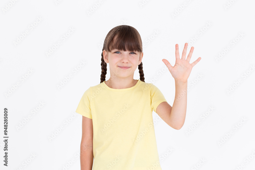 Friendly young girl, small lady waving hand and saying hello, hi gesture, standing over white background Friendly young girl, small lady waving hand and saying hello, hi gesture, standing over white background