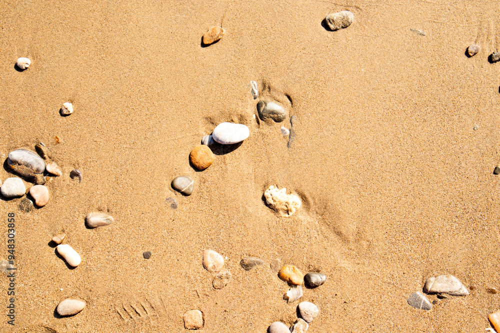 Beach sand with natural stones,background