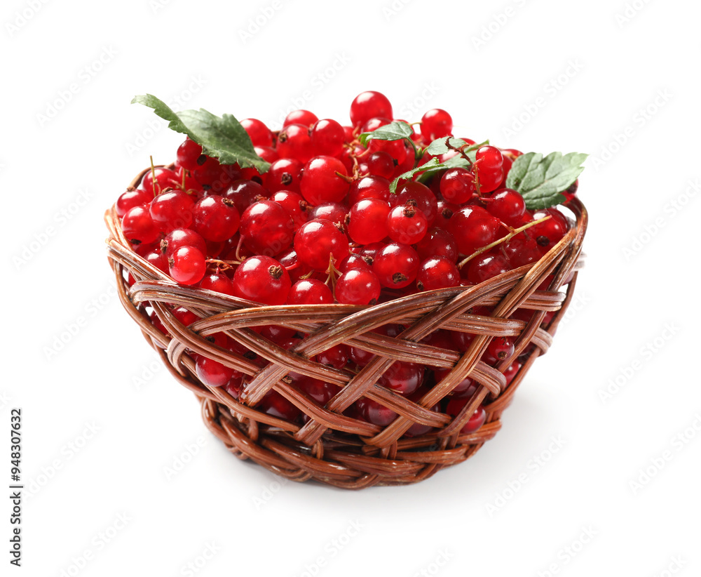 Ripe red currants with green leaves in basket isolated on white Ripe red currants with green leaves in basket isolated on white