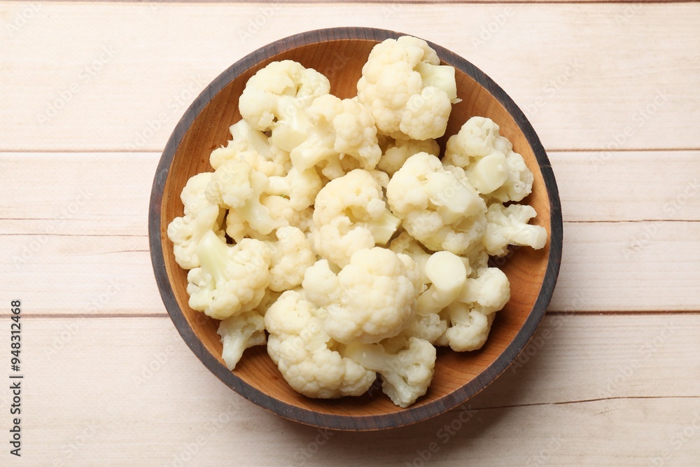 Tasty cooked cauliflower on white wooden table, top view Tasty cooked cauliflower on white wooden table, top view