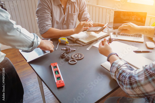 team Engineers and designers teamed up to discuss and consult with each other about machine structure to calculate and design for safe operation of the machine and as required by customers. photo