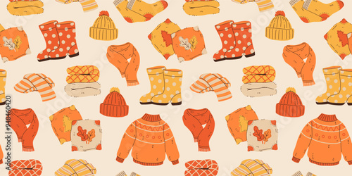 Seamless pattern of cozy autumnal sweaters, scarves, socks, and warm accessories. Fall apparel clothes, cardigan, beanie kit. Vector hand drawn flat cartoon collection illustration