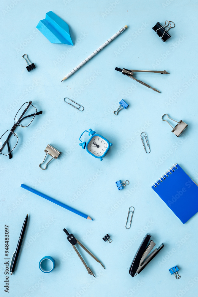 Creative flat lay with school supplies and stationery, top view Creative flat lay with school supplies and stationery, top view