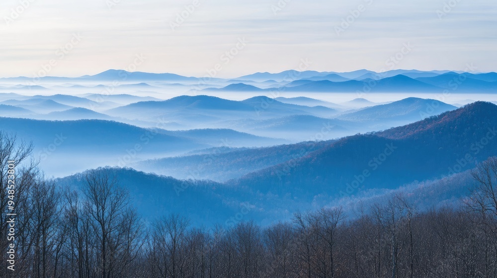 A panoramic view of the Blue Ridge Mountains with layers of mist. No people, copy space. A panoramic view of the Blue Ridge Mountains with layers of mist. No people, copy space.