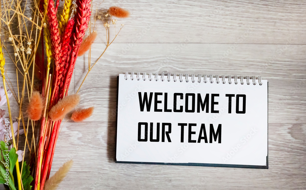Naklejka premium Welcome to our team symbol. Conceptual words Welcome to our team on a notepad Beautiful background.