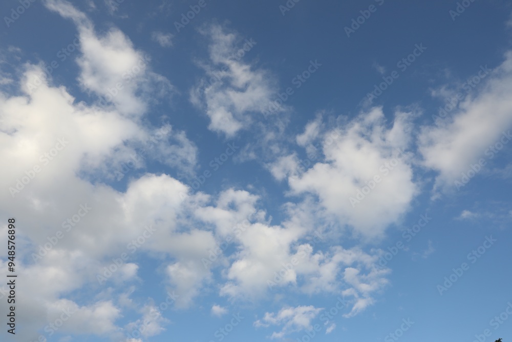 Beautiful view of blue sky with fluffy clouds Beautiful view of blue sky with fluffy clouds