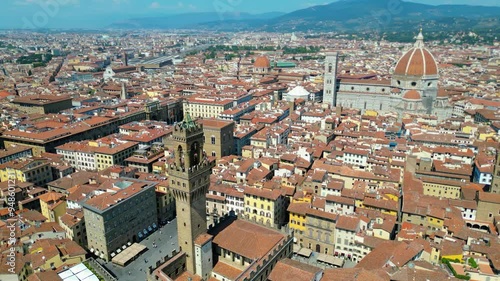 An aerial view of Florence, Italy, captured by a drone, highlighting the city's stunning Renaissance architecture and iconic landmarks. Florence, the cradle of the Renaissance, is renowned for it photo