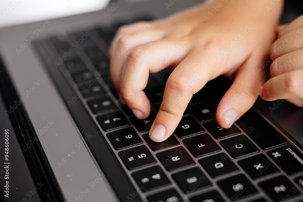 Close-up of children's hands typing on a laptop keyboard. Perfect for educational content, technology use by kids, or highlighting early learning in a digital age. Close-up of children's hands typing on a laptop keyboard. Perfect for educational content, technology use by kids, or highlighting early learning in a digital age.