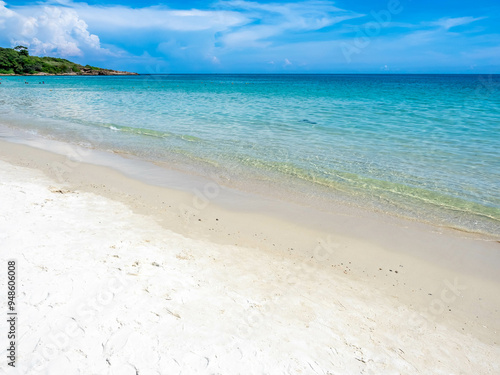 Seascape view with white sand, quiet beach, clear sea water, blue sky in summer of Koh Samet (Samet Isalnd) in Thailand