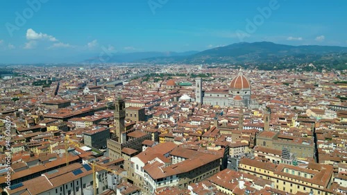 An aerial view of Florence, Italy, captured by a drone, highlighting the city's stunning Renaissance architecture and iconic landmarks. Florence, the cradle of the Renaissance, is renowned for it photo