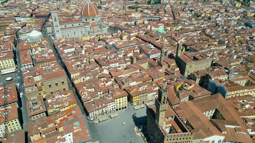 An aerial view of Florence, Italy, captured by a drone, highlighting the city's stunning Renaissance architecture and iconic landmarks. Florence, the cradle of the Renaissance, is renowned for it photo