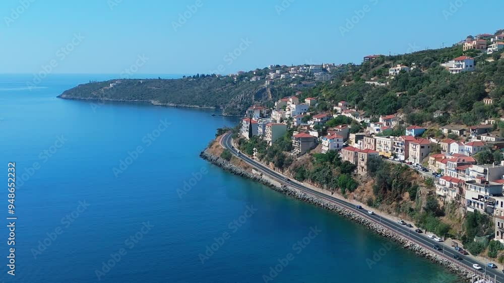 greece peloponnese region gytheio town lighthouse coastal houses chapel and boats aerial view 4k footage greece peloponnese region gytheio town lighthouse coastal houses chapel and boats aerial view 4k footage