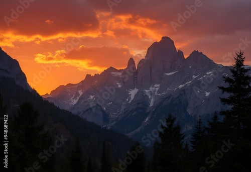 Majestic Mountain Sunset with Vibrant Orange and Red Sky
