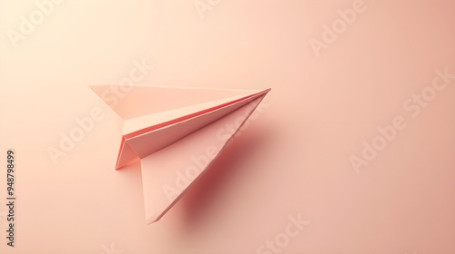 Free Download A close-up shot of a realistic paper airplane resting on a light solid color background, showcasing its folds and creases - GFXLoad