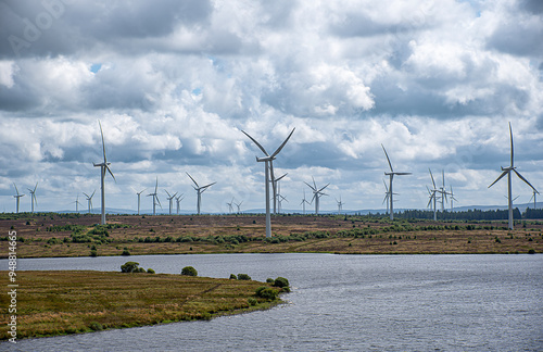 Landscape photography of wind turbine; windmill; wind power; power generation; electricity; industry; innovation; green energy; Whitelee Windfarm, Scotland photo