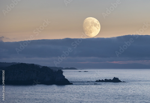 Playing with the moon and multiple exposure for ideal locations! photo