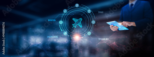 Fotografi Aerospace: Businessman using tablet analyzing aerospace record on tablet