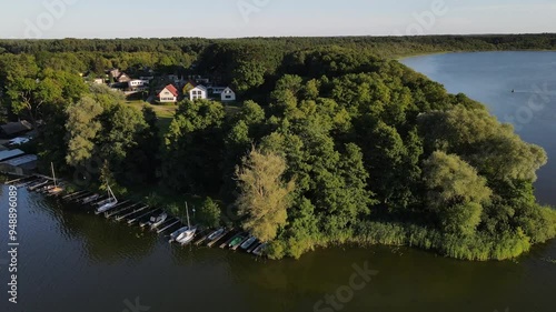 Fly over the a green and scenic nature area called Jabelscher See which is located at the Mecklenburg Vorpommern Lake area as the known former East Germany region photo