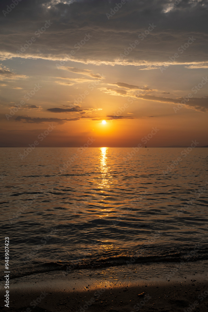 Fototapeta premium Spectacular sunset on the sea. Greece, Neos Marmaras.
