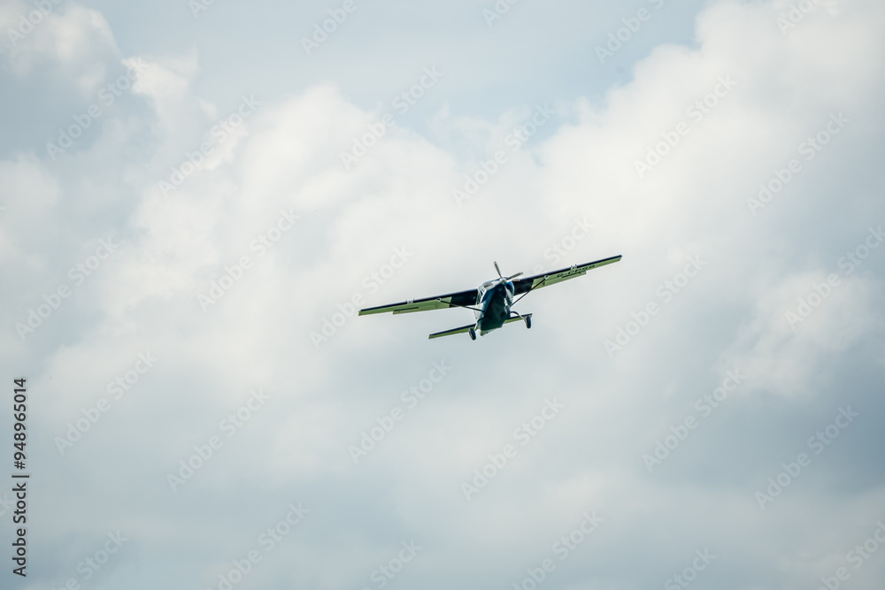 Cessna 208b Grand Caravan G-CPSS light aircraft ascending from take off Cessna 208b Grand Caravan G-CPSS light aircraft ascending from take off
