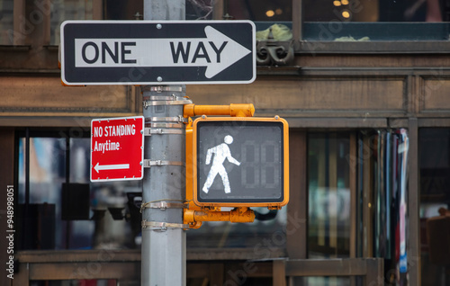 Photography One way and no standing anytime signs and traffic light for pedestrians, New Yor