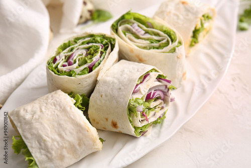 Plate of tasty lavash rolls...
