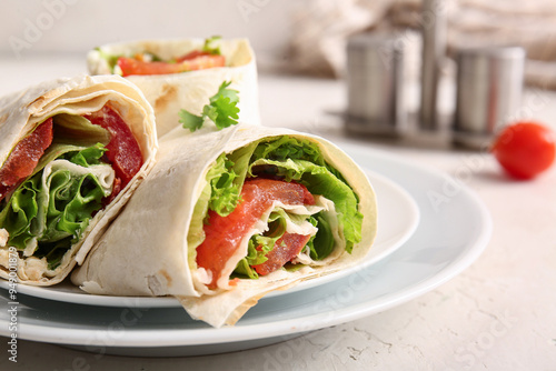 Plates of tasty lavash roll...