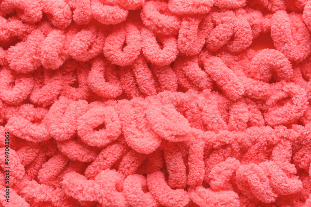 Closeup view of coral knitted cloth Closeup view of coral knitted cloth