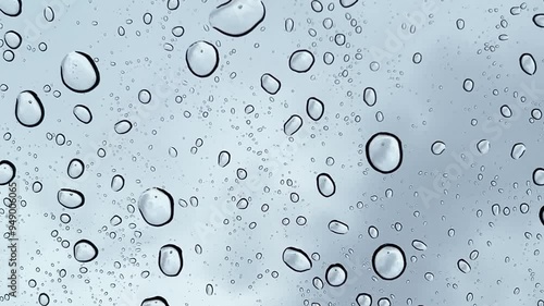 Rain water drops on glass