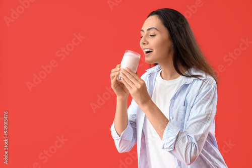 Young woman with tasty yogh...