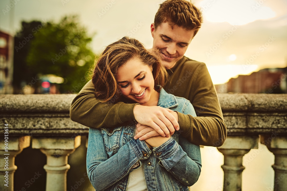 Happy couple, hug and comfort with love in city for warm embrace, support or outdoor travel together. Young man, woman or lovers with smile for affection, romantic holiday or trip in an urban town Happy couple, hug and comfort with love in city for warm embrace, support or outdoor travel together. Young man, woman or lovers with smile for affection, romantic holiday or trip in an urban town