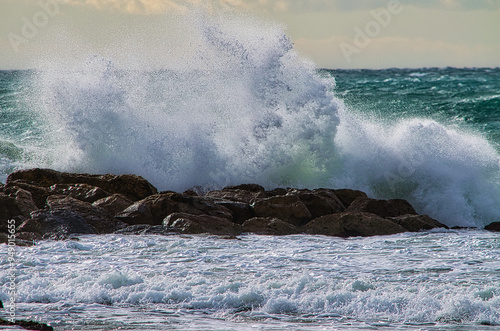 waves breaking on rocks