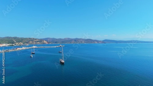 greece peloponnese region gytheio town lighthouse coastal houses chapel and boats aerial view 4k footage photo