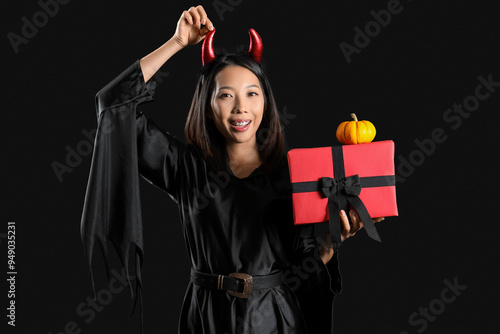 Young Asian woman dressed f...