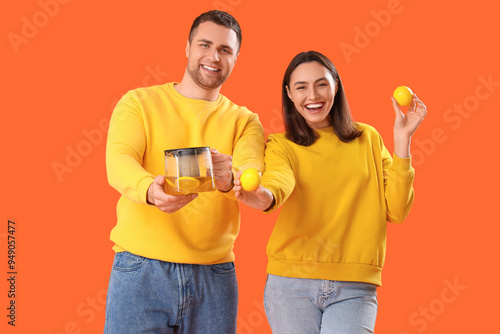 Young couple with teapot an...