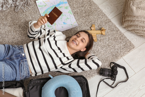 Young woman with passport a...