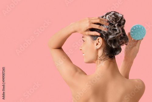 Beautiful young woman washi...
