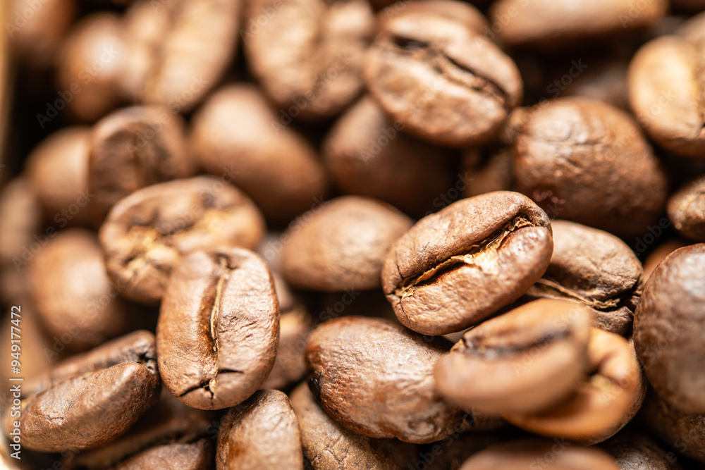 Fototapeta premium Close-Up View of Roasted Coffee Beans, Showcasing Rich Textures and Deep Brown Color for Coffee Enthusiasts and Culinary Projects