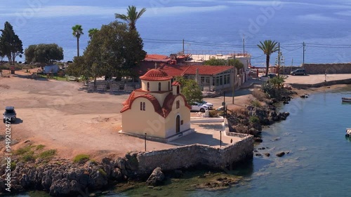 greece peloponnese region gytheio town lighthouse coastal houses chapel and boats aerial view 4k footage photo