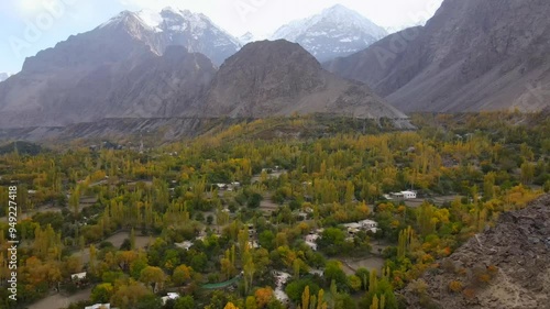 Aerial view of Kachura Lake surrounded by majestic mountains and colorful autumn foliage in Soq Valley, Skardu, Pakistan. photo