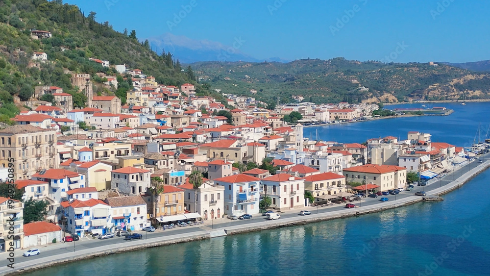 Naklejka premium greece peloponnese region gytheio town lighthouse coastal houses chapel and boats aerial view